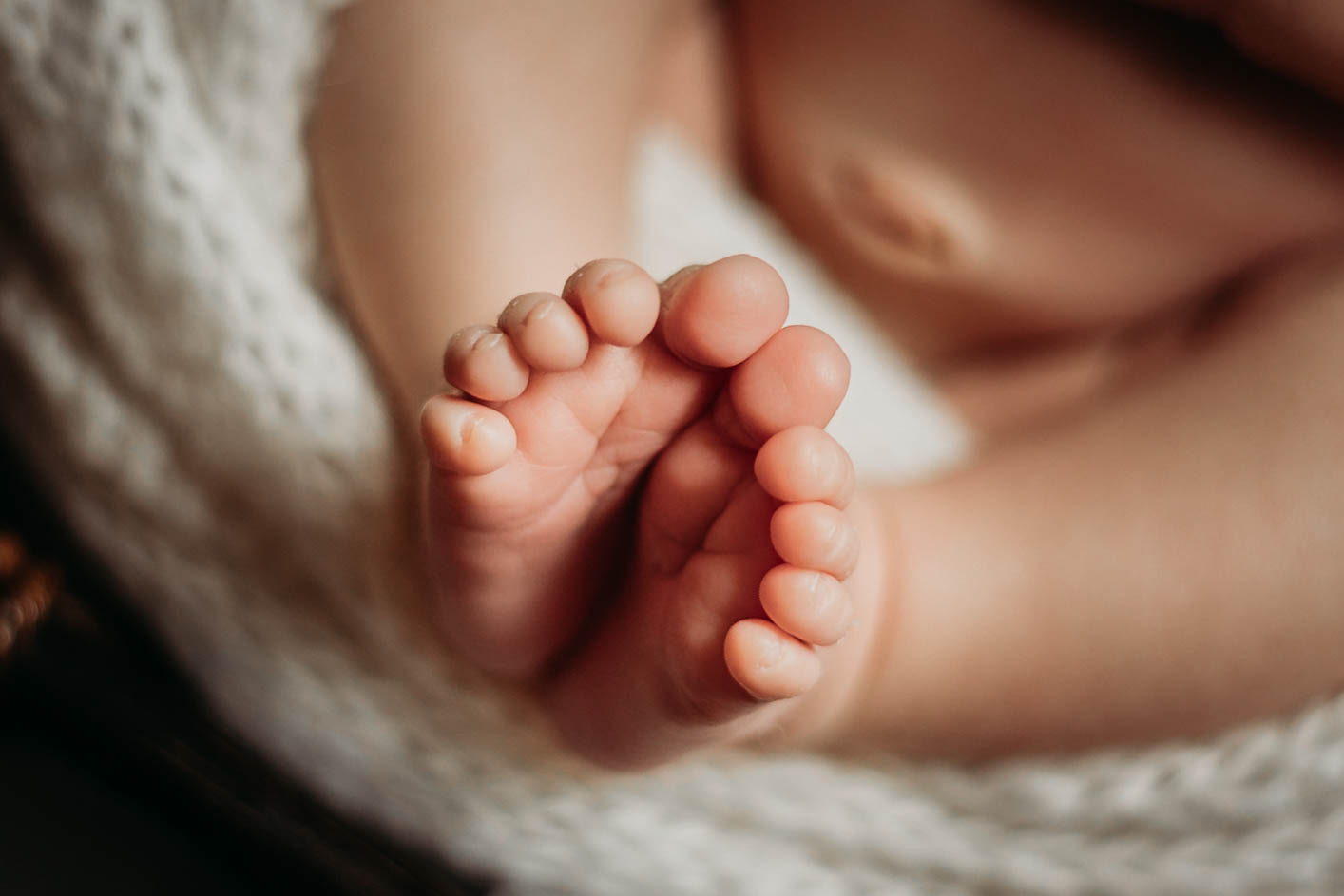 Newborn baby toes in Janesville, WI