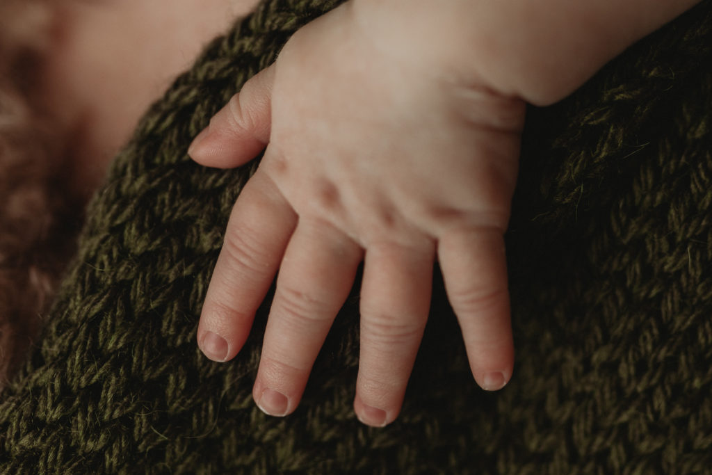 Baby hands photograph by Olivia Acton Photography in Janesville, WI