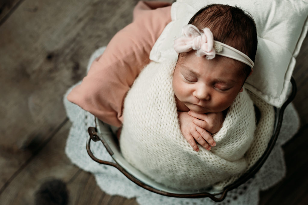 Newborn girl in props in Janesville, WI by Olivia Acton Photography