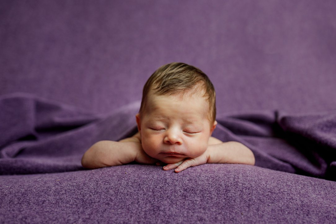 Newborn girl in props in Janesville, WI
