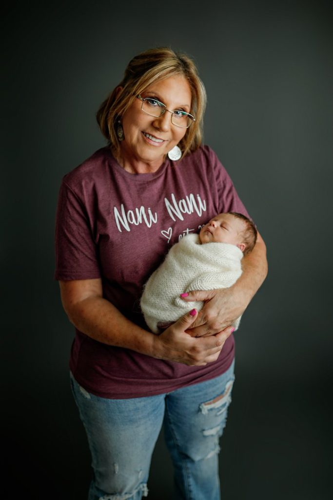 Grandma and baby during newborn session in Janesville, WI